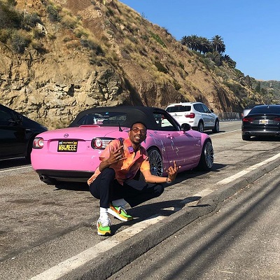 Harvey Jr. posing at the middle of the road. Know about Harvey Jr.'s personal life, girlfriend, marriage